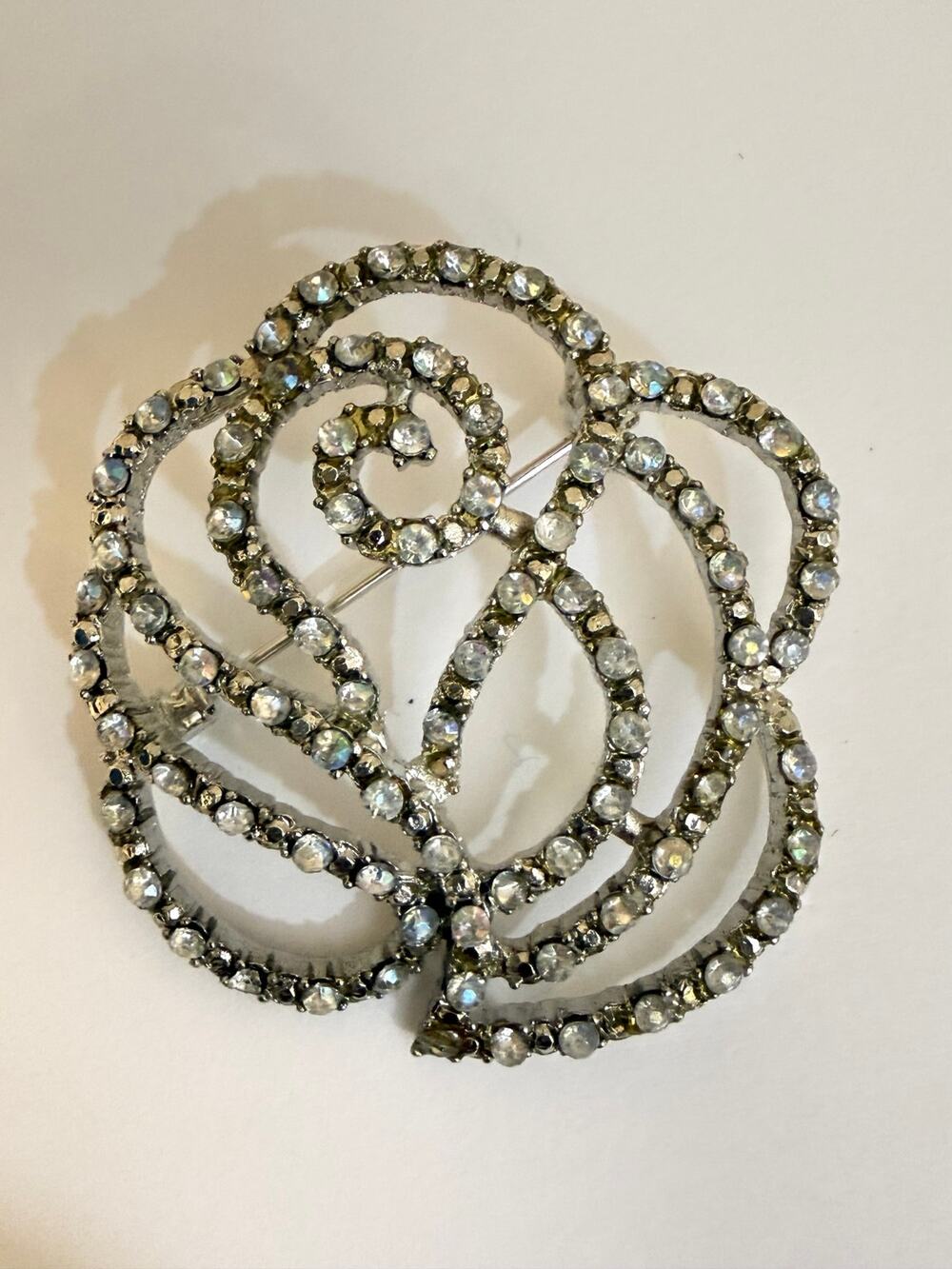 Vintage Gold Tone Clear Rhinestone Floral Swirl Brooch